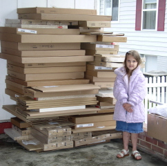Pile of cabinets in boxes